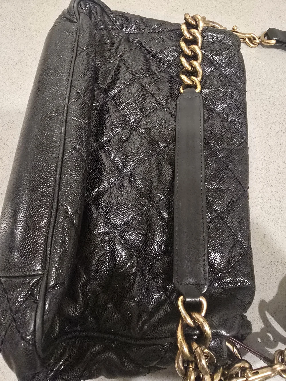 CHANEL Black Quilted Shoulder Bag with Gold Turn-Lock, Long Cross Body Strap